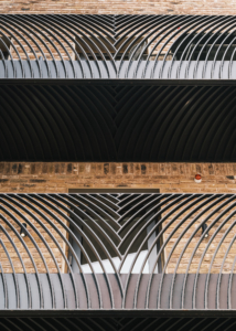 View of front and underside of balcony in 12-13 Greek Street. Image shows the double curved steel balcony, with continued curved pattern to soffit of balcony.