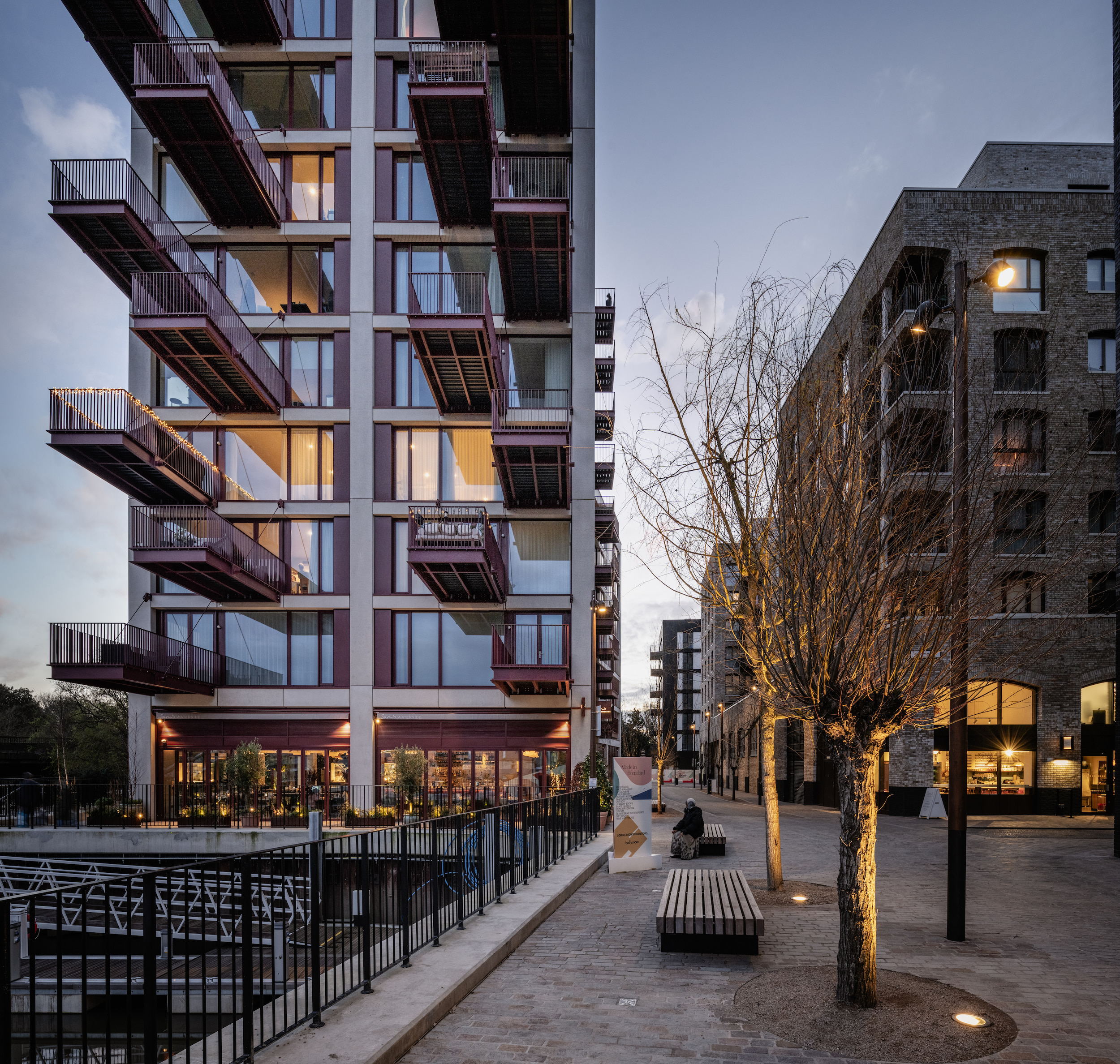 Dusk view of Hollandbury House with canal to left